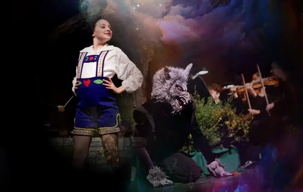 Theatrical scene with a Bavarian costume and wolf costume.